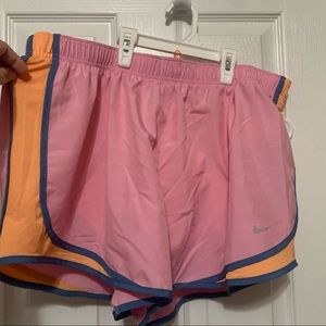 Pink Nike running shorts